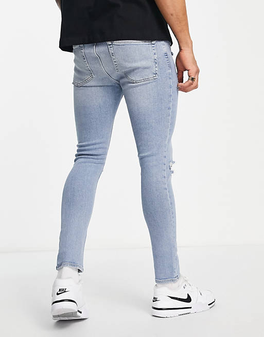 Mens Clothing Jeans Skinny jeans ASOS Denim Spray On vintage Look Jeans With Power Stretch in Blue for Men 
