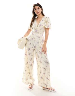 ASOS DESIGN spun flutter sleeve wide leg jumpsuit in floral print