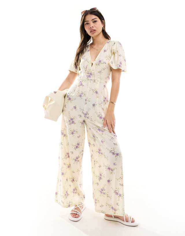 ASOS DESIGN - spun flutter sleeve wide leg jumpsuit in floral print