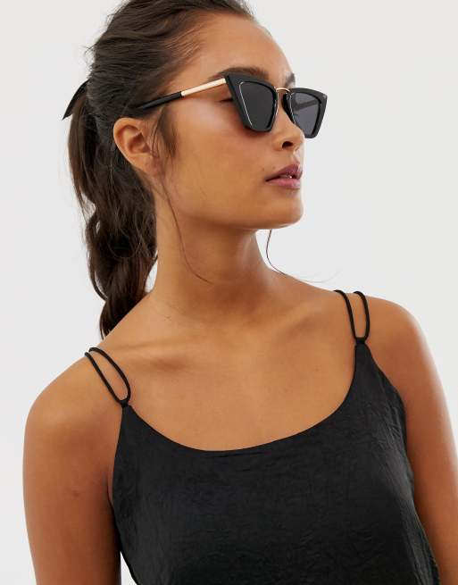 ASOS DESIGN metal cat eye sunglasses in gold with pink lens