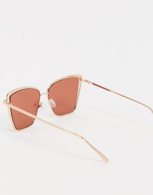 ASOS DESIGN metal cat eye sunglasses in gold with pink lens