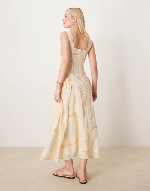 ASOS DESIGN square neck prairie maxi dress with dropped waist in blown-out postcard print