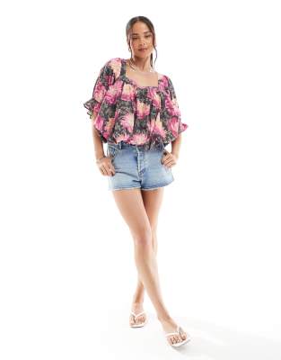 ASOS DESIGN square neck puff blouse in floral print