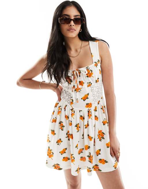  ASOS DESIGN square neck ruched bust mini dress with lace inserts in orange fruit print