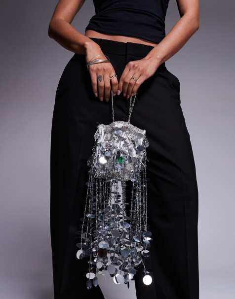 ASOS DESIGN – Srebrna cekinowa torebka do ręki z frędzlami - view 1
