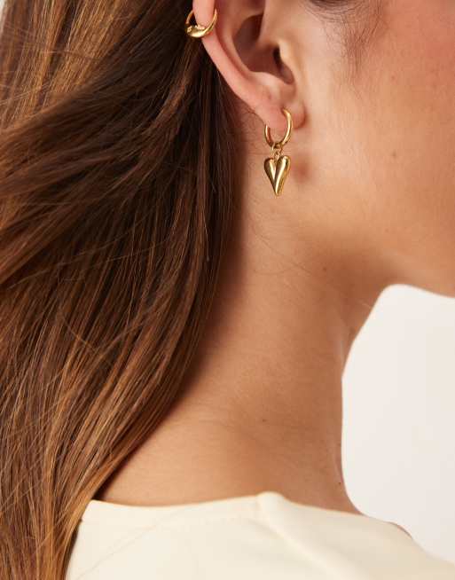ASOS DESIGN stainless steel mini hoop earrings with heart pendant drop in antique gold tone