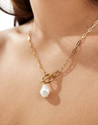 stainless steel necklace with open link tbar and faux freshwater pearl pendant in gold tone