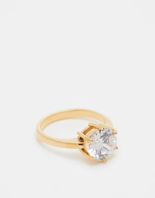 ASOS DESIGN stainless steel ring with round cubic zirconia stone in gold tone with gift bag φωτογραφία