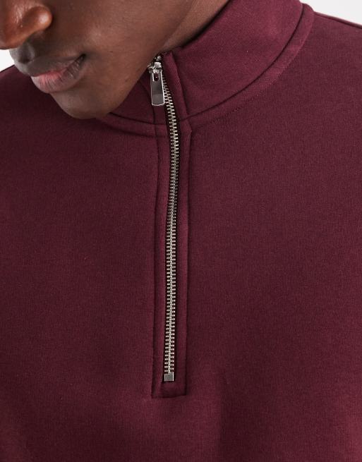 ASOS DESIGN standard fit quarter zip sweatshirt in burgundy