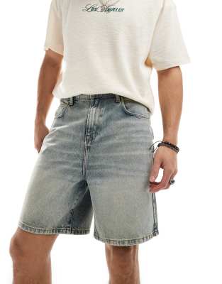 FhyzicsShops DESIGN standard length denim jorts in light wash blue