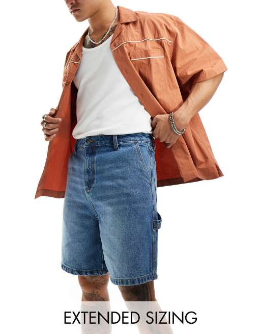 ASOS DESIGN standard length denim jorts with carpenter detail in mid wash blue
