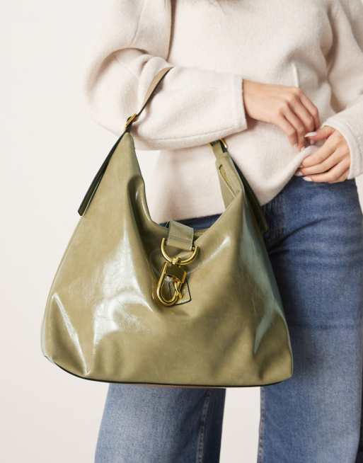 ASOS DESIGN statement buckle slouch tote bag in light khaki
