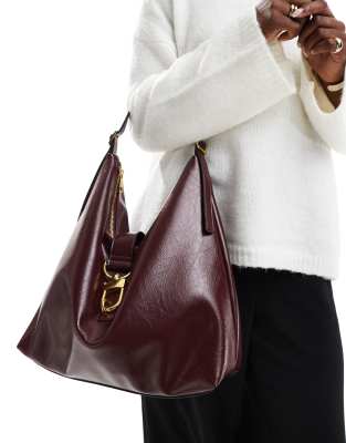 ASOS DESIGN statement buckle slouchy tote bag in burgundy