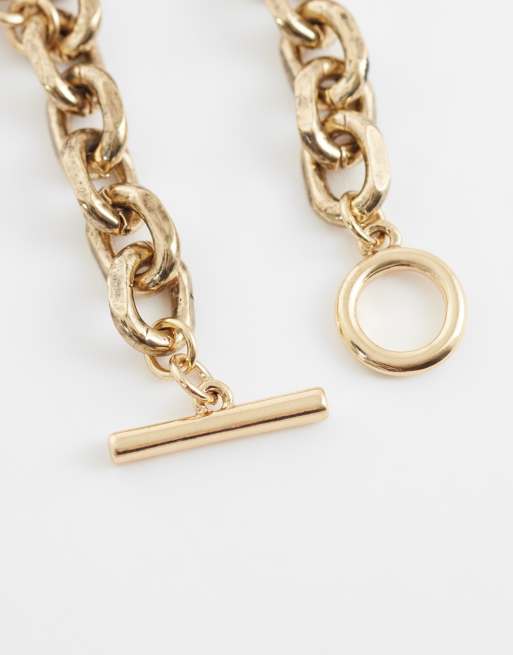 ASOS DESIGN statement charm link bracelet with multi charms in gold tone, 3 of 4
