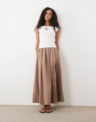 ASOS DESIGN – Stenfärgad midikjol i bomull med volym — kjol med fickor från ASOS