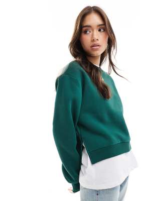 stepped hem sweat in forest green