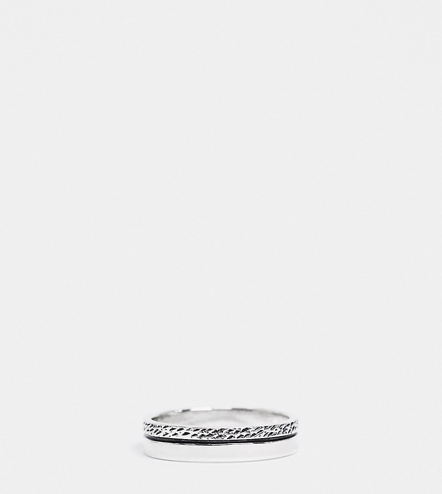 sterling silver band ring with textured design in burnished silver