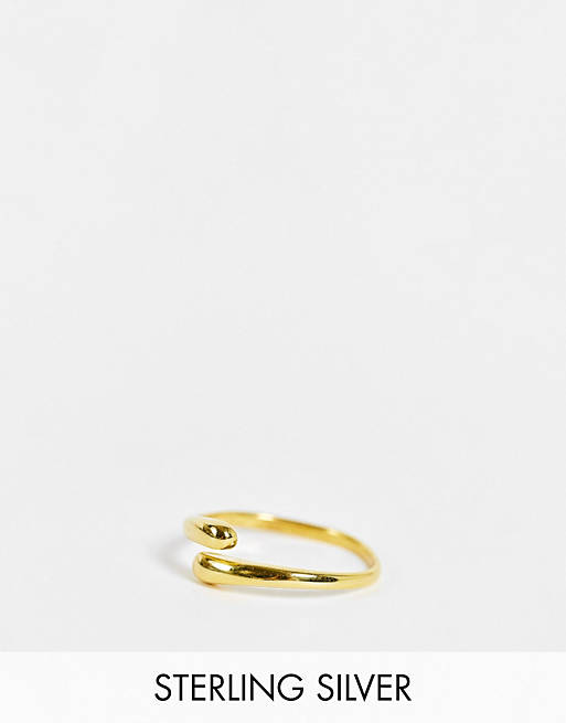 ASOS DESIGN sterling silver with gold plate ring in melt wraparound design