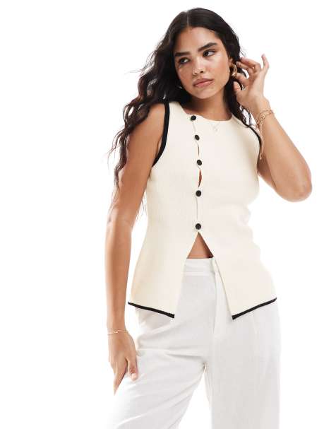 ASOS DESIGN – Stickad, asymmetrisk kostymväst med kantrand - view 1