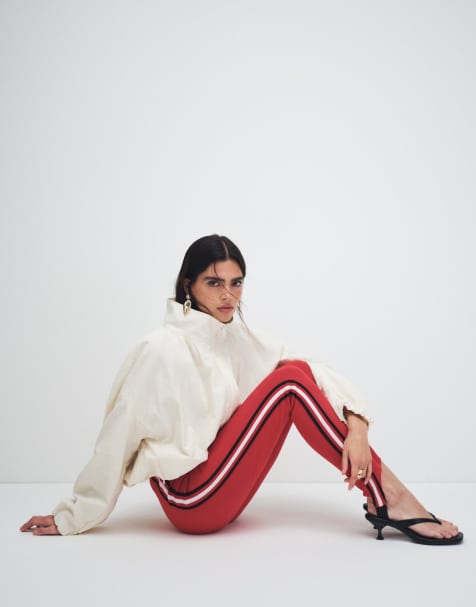 ASOS DESIGN stirrup leggings with contrast side stripe in red - view 1