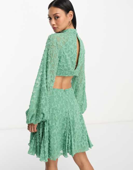 ASOS DESIGN – Stjärnmönstrat jacquardvävd miniklänning med hög krage och utskurna detaljer, 2 av 4