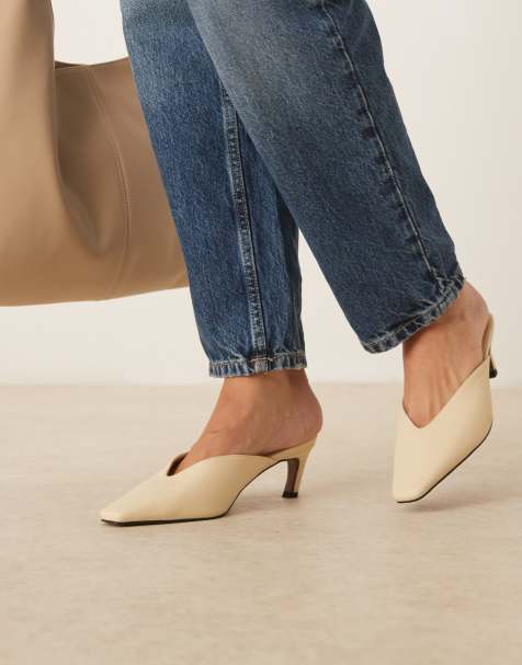 ASOS DESIGN Storm chisel toe mid heel mule in buttermilk - view 1