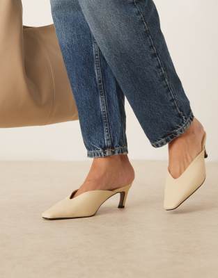Asos Design Storm Chisel Toe Mid Heel Mules In Yellow