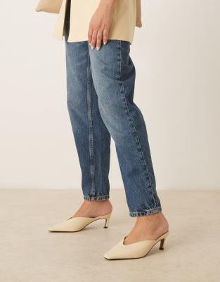 Asos Design Storm Chisel Toe Mid Heel Mules In Yellow