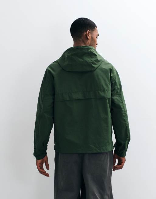 ASOS DESIGN  stormMAX™ water repellent overhead rain jacket in dark green, 3 of 5