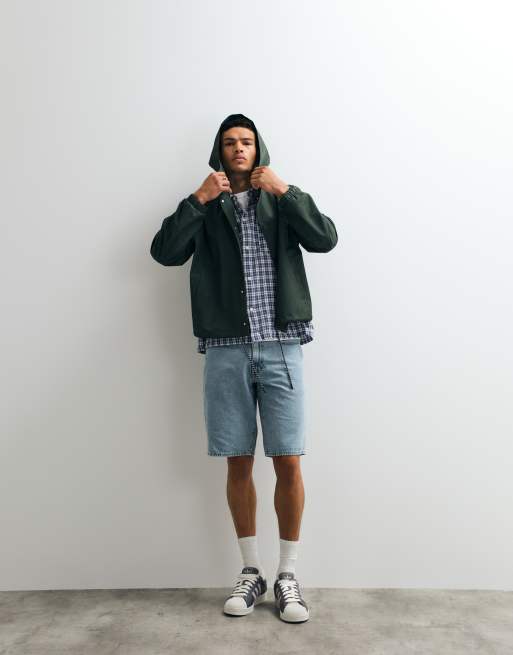ASOS DESIGN stormMAX™ water repellent oversized raincoat in dark green, 4 of 7