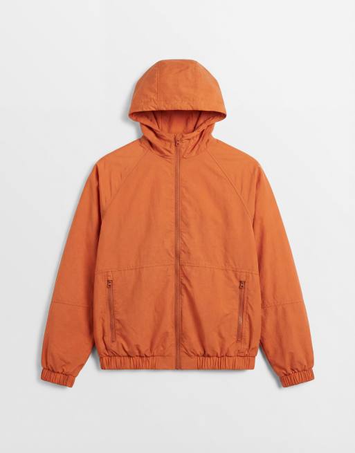ASOS DESIGN stormMAX™ water repellent packaway rain jacket in orange, 6 of 7