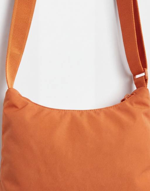 ASOS DESIGN stormMAX™ water repellent packaway rain jacket in orange, 9 of 9