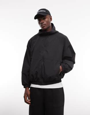 Asos Design Stormmax™ Water Resistant Packaway Rain Jacket In Black