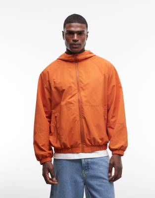 Asos Design Stormmax™ Water Resistant Packaway Rain Jacket In Orange
