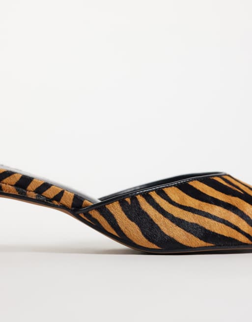 ASOS DESIGN Stormy hair on real leather chisel toe heeled mules in tiger, 3 of 4