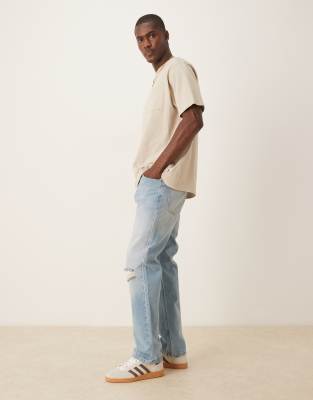 Asos Design Straight Fit Jeans With Rips In Blue