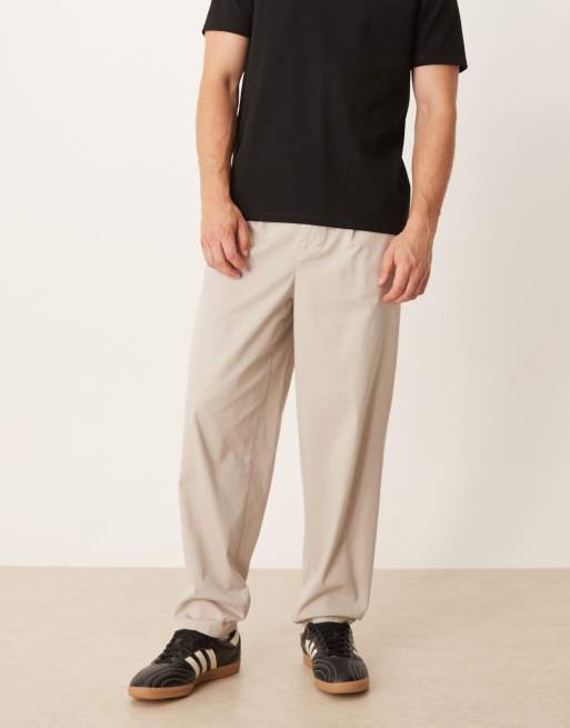 ASOS DESIGN straight fit jeans with rips in mid wash 
