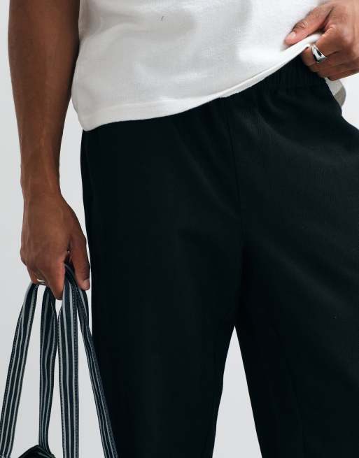 ASOS DESIGN straight herringbone pants in black with elasticized waistband, 2 of 5