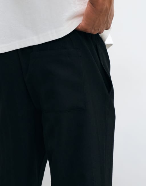 ASOS DESIGN straight herringbone trouser in black with elasticated waistband, 4 of 5