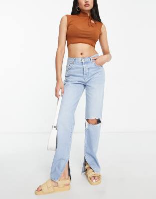 ASOS DESIGN straight jeans in light wash with rip and split hem