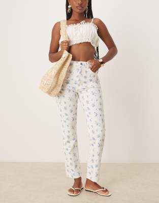ASOS DESIGN - Straight Jeans mit mittelhohem Bund und Blumenmuster-Bunt