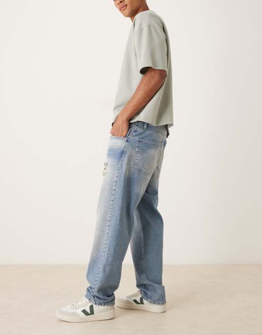 ASOS DESIGN straight leg jeans in mid wash blue with rips