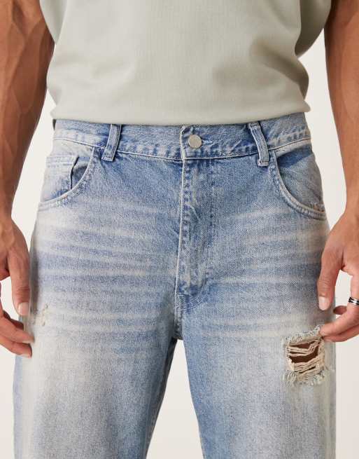 ASOS DESIGN straight leg jeans in mid wash blue with rips