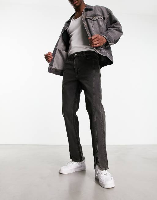 ASOS DESIGN straight leg jeans in washed black with hem split