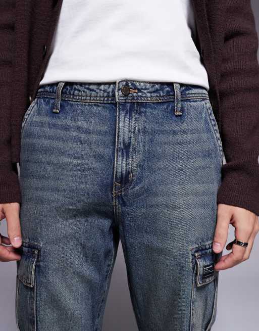 ASOS DESIGN straight leg jeans with cargo detail in mid wash blue, 5 of 5