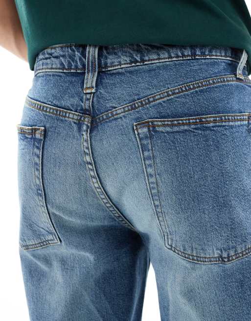 ASOS DESIGN straight leg jeans with stretch in mid wash blue, 4 of 5