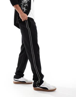 ASOS DESIGN straight leg jogger with side tape in black