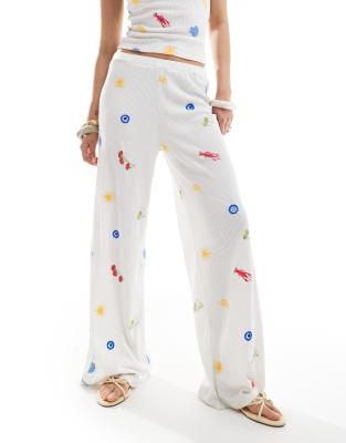 ASOS DESIGN STRAIGHT LEG PANTS WITH VACATION EMBROIDERY 