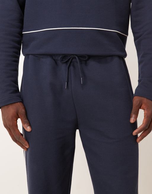 ASOS DESIGN straight leg pique sweatpants with side piping in navy, 4 of 5