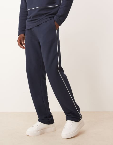 ASOS DESIGN straight leg pique trackies with side piping in navy - view 1